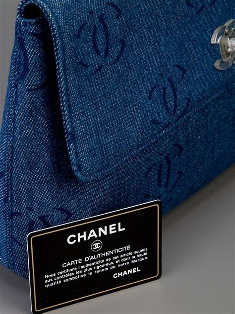 vintage tan chanel clutch|Chanel denim clutch.